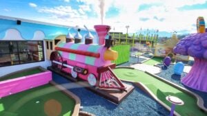 Candy striped train at a mini golf course